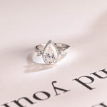 Stunning 1.0 - 2.0 CT Pear Moissanite Engagement Ring with Pave & Halo Design 1