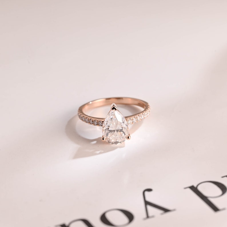 Stunning 1.0 - 2.0 CT Pear Moissanite Engagement Ring with Pave Design 1