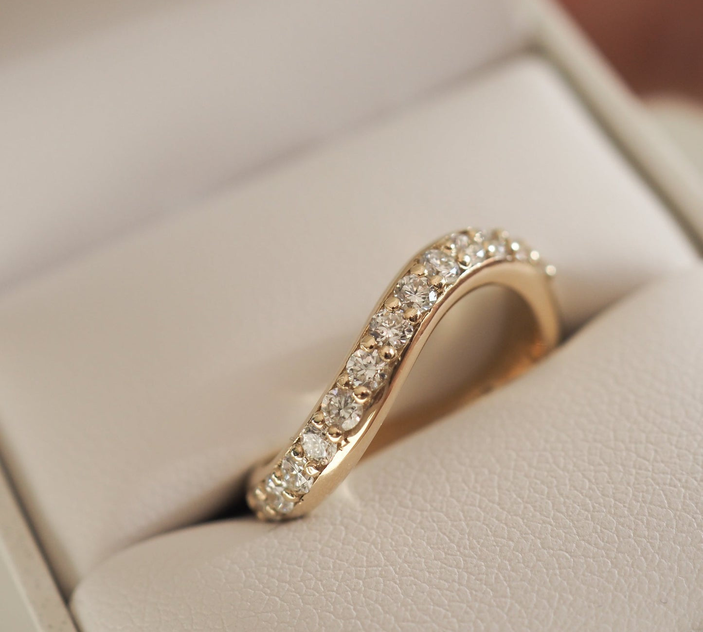 Stunning 0.4 TCW Round Moissanite Stones Curved Wedding Band