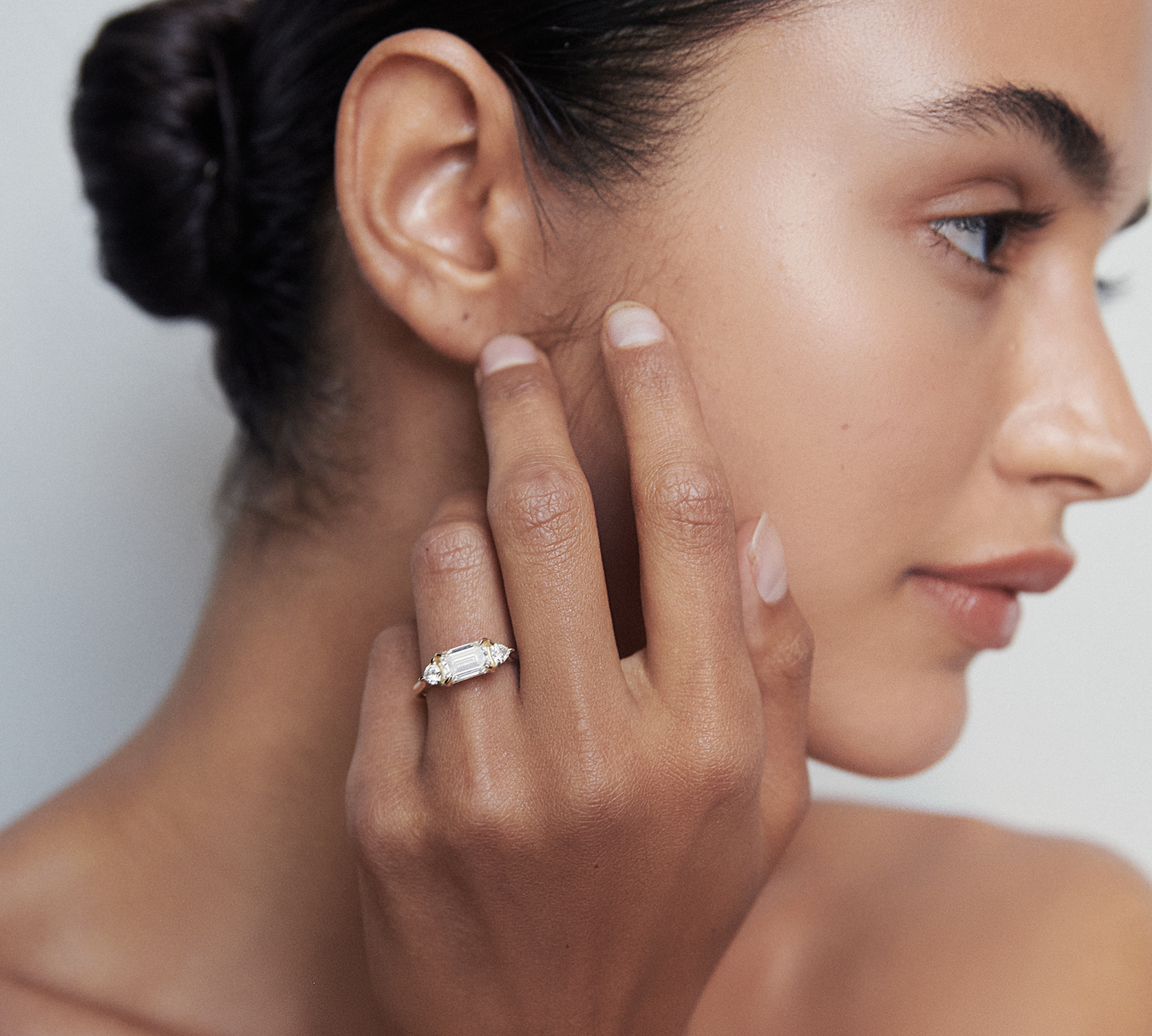 Stunning 1.3 CT Emerald Moissanite Engagement Ring with Three Stone Design