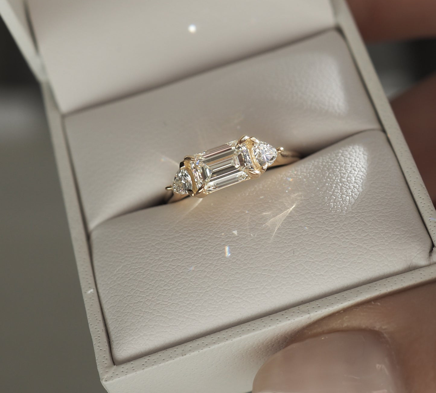 Stunning 1.3 CT Emerald Moissanite Engagement Ring with Three Stone Design