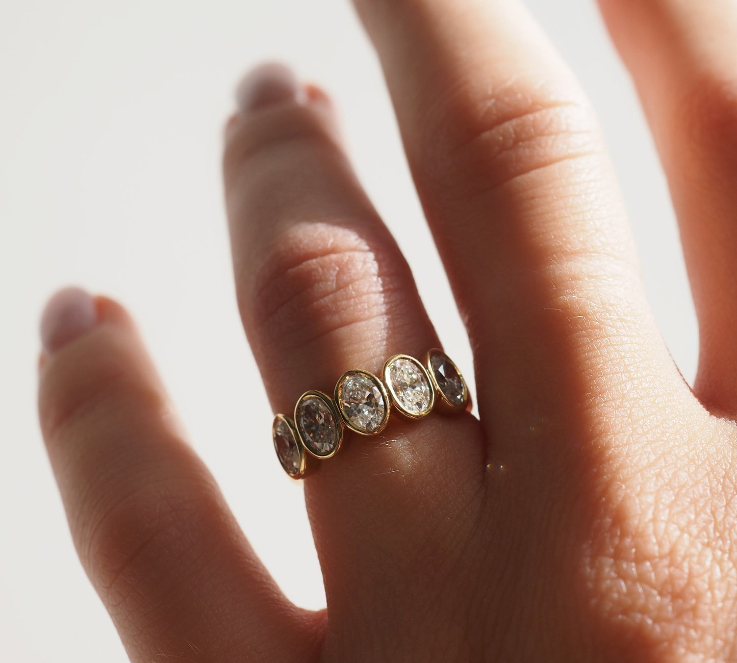 Stunning 1.65 TCW Oval Moissanite Stones Bezel Wedding Bands