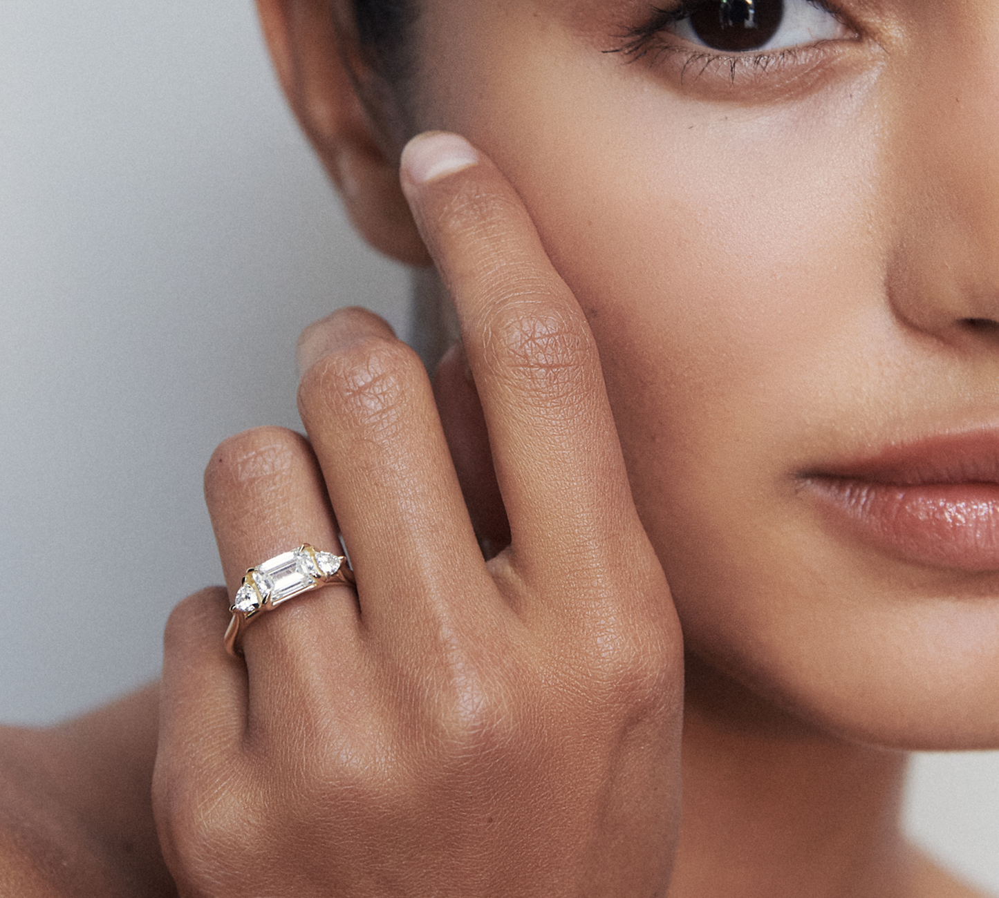 Stunning 1.3 CT Emerald Moissanite Engagement Ring with Three Stone Design