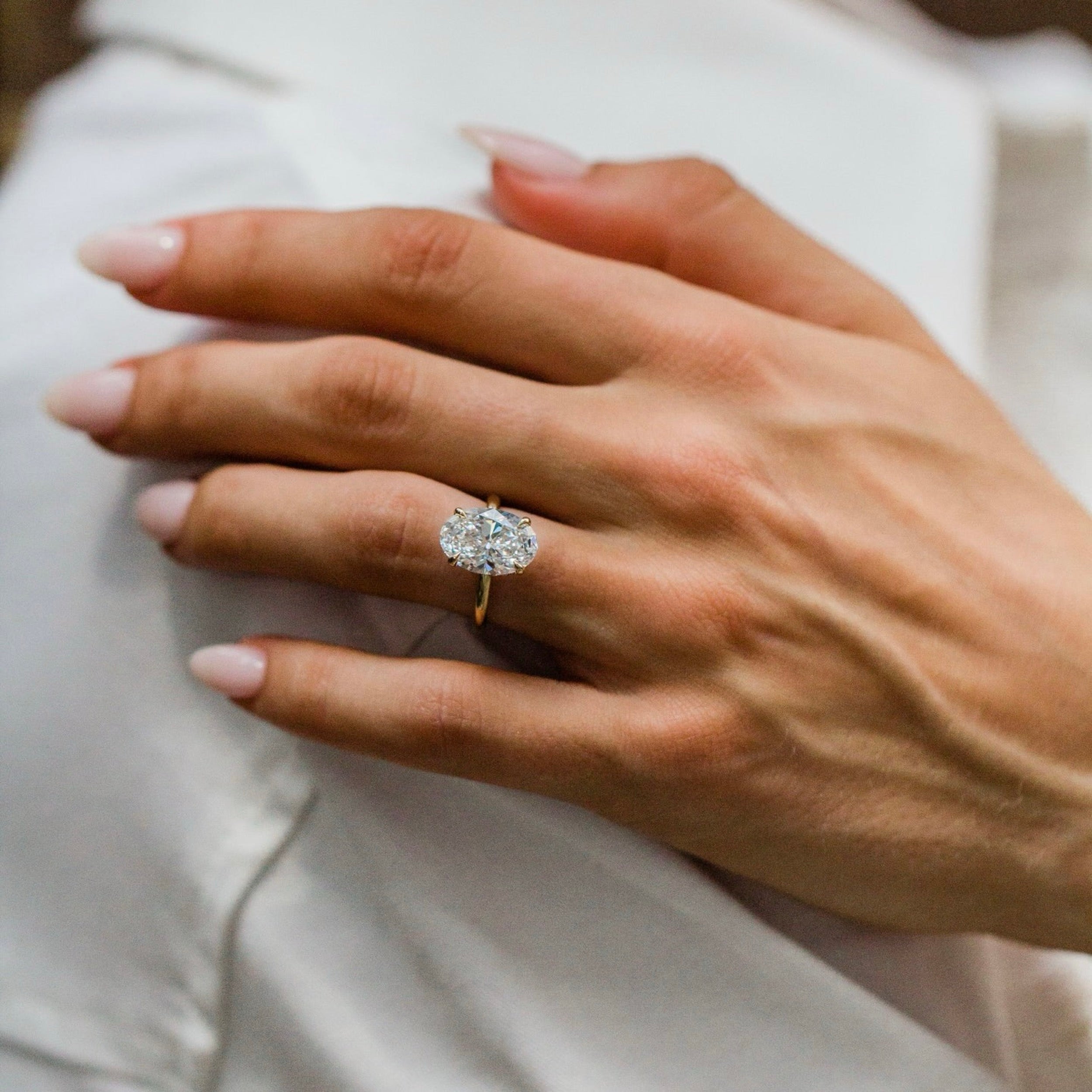 3 CT Oval Shaped Lab Grown Diamond Hidden Halo Engagement Ring