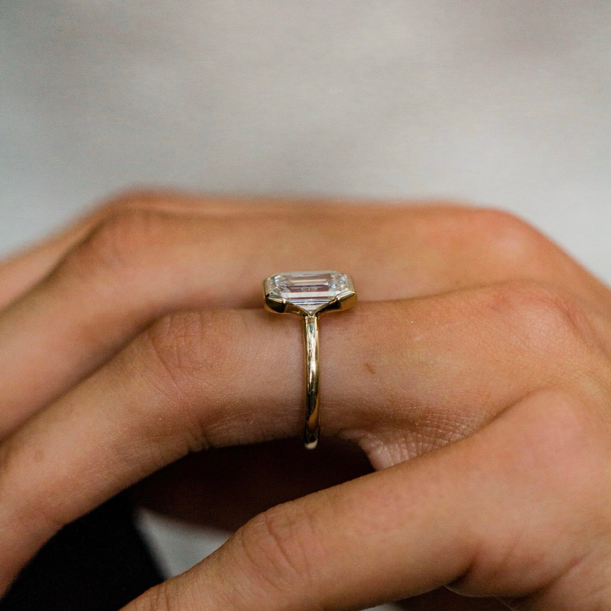 2.5 CT Emerald Shaped Lab Grown Diamond Bezel Solitaire Engagement Ring