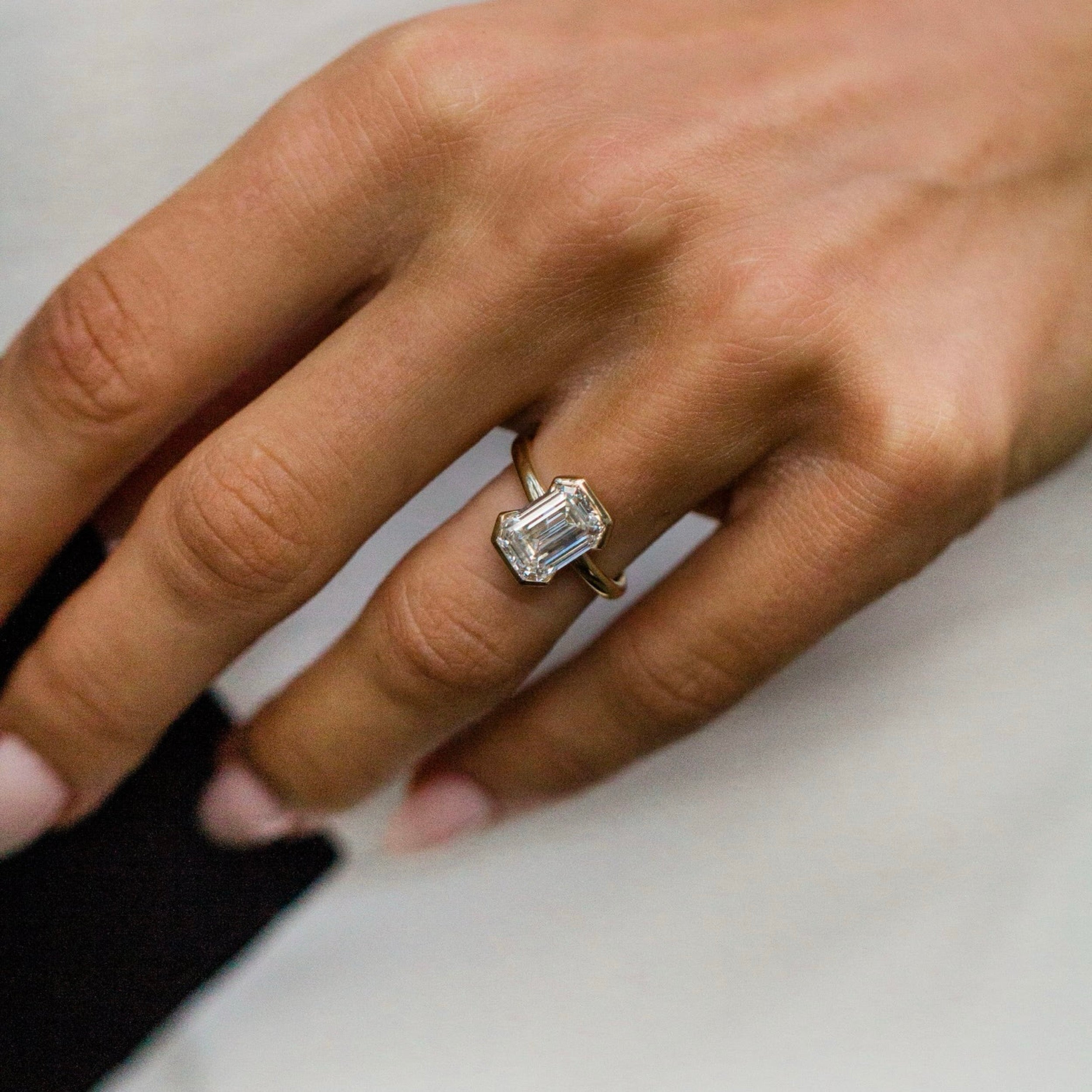 2.5 CT Emerald Shaped Lab Grown Diamond Bezel Solitaire Engagement Ring