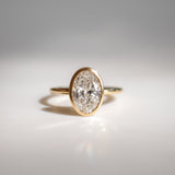 1 CT Oval Shaped Bezel Lab Grown Diamond Engagement Ring