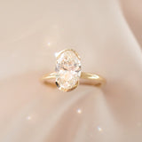 2.02 CT Oval Shaped Half Bezel Lab Grown Diamond Engagement Ring