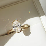 2.02 CT Oval Shaped Half Bezel Lab Grown Diamond Engagement Ring