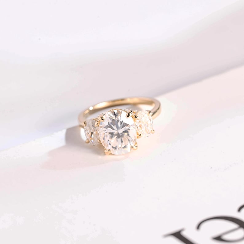 Stunning 1.0 - 2.0 CT Oval Moissanite Engagement Ring with Three Stone Design 1