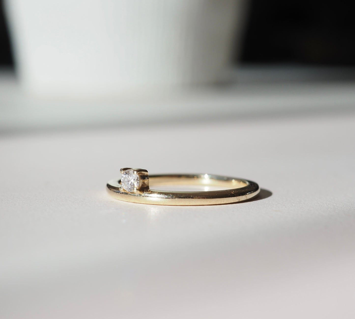 Stunning 0.2 CT Round Moissanite Engagement Ring with Solitaire Design