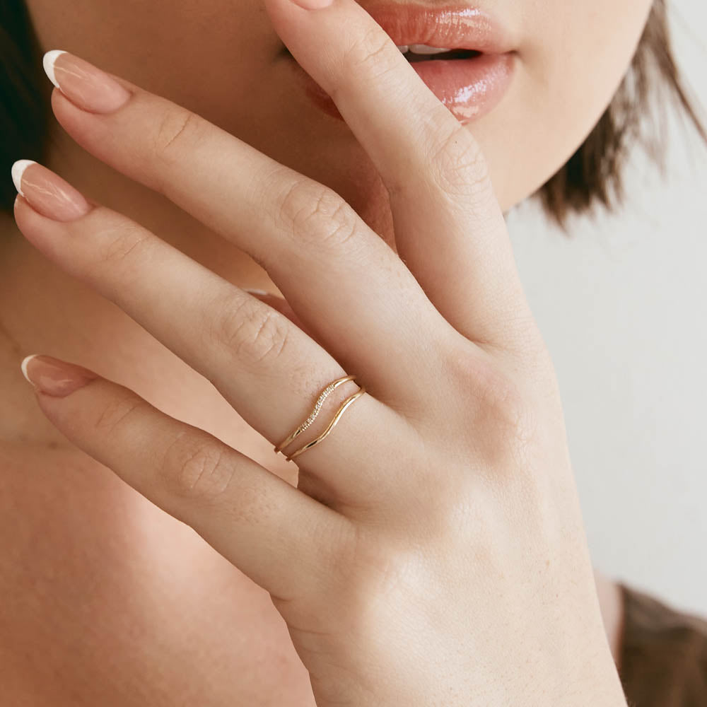 0.02 TCW Round Moissanite Wave Wedding Band