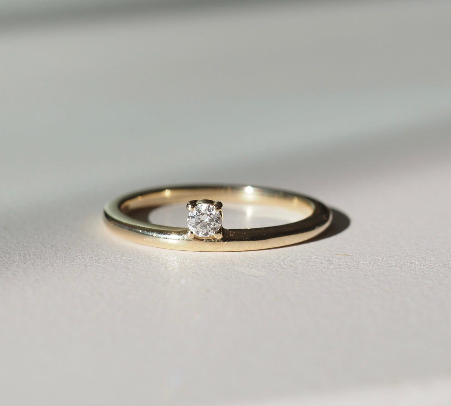 Stunning 0.2 CT Round Moissanite Engagement Ring with Solitaire Design