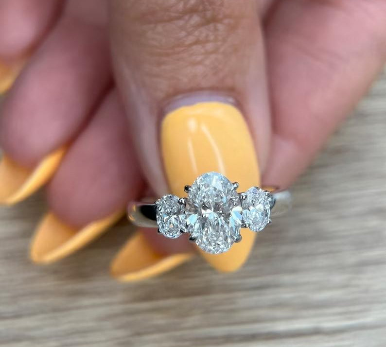 1.50 CT Oval Three Stones Lab Grown Diamond Engagement Ring