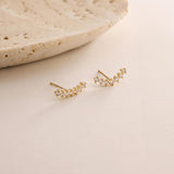 0.4 TCW Round Moissanite Curved Bar Stud Earrings