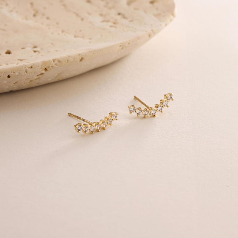 0.4 TCW Round Moissanite Curved Bar Stud Earrings