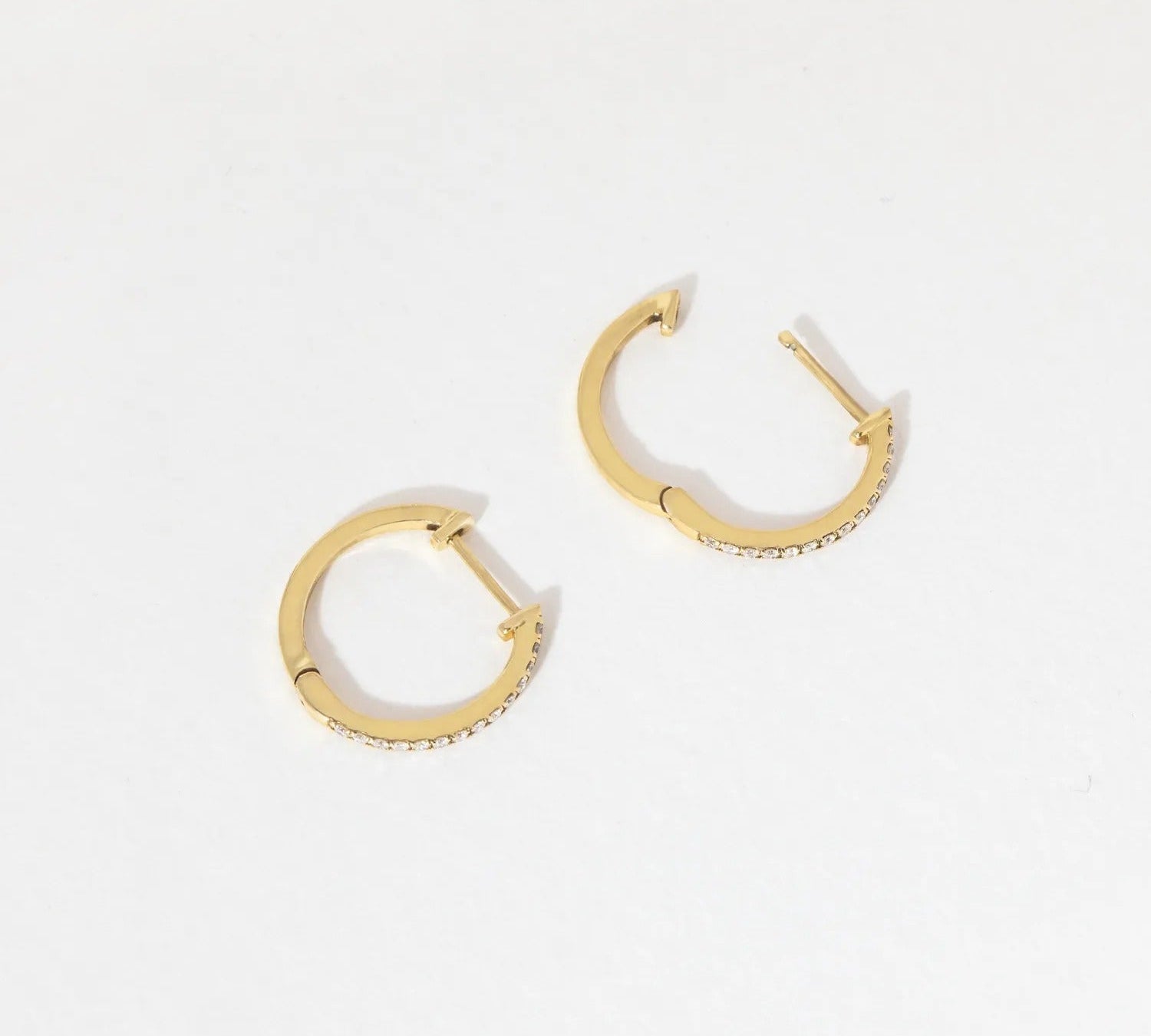 0.6 TCW Round Moissanite Hoop Earrings