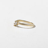 0.23 TCW Round, Tapered Baguette, and Pear unique Wedding Band
