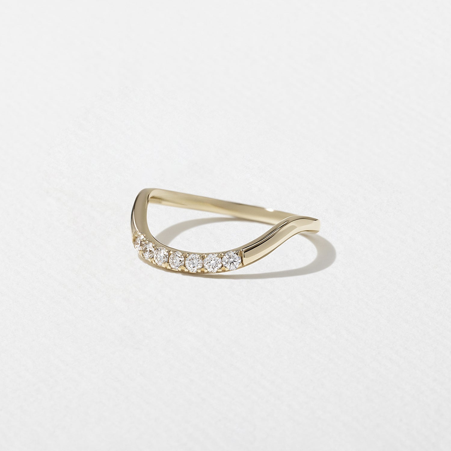 0.14 TCW Round Shape Unique Curved Wedding Band