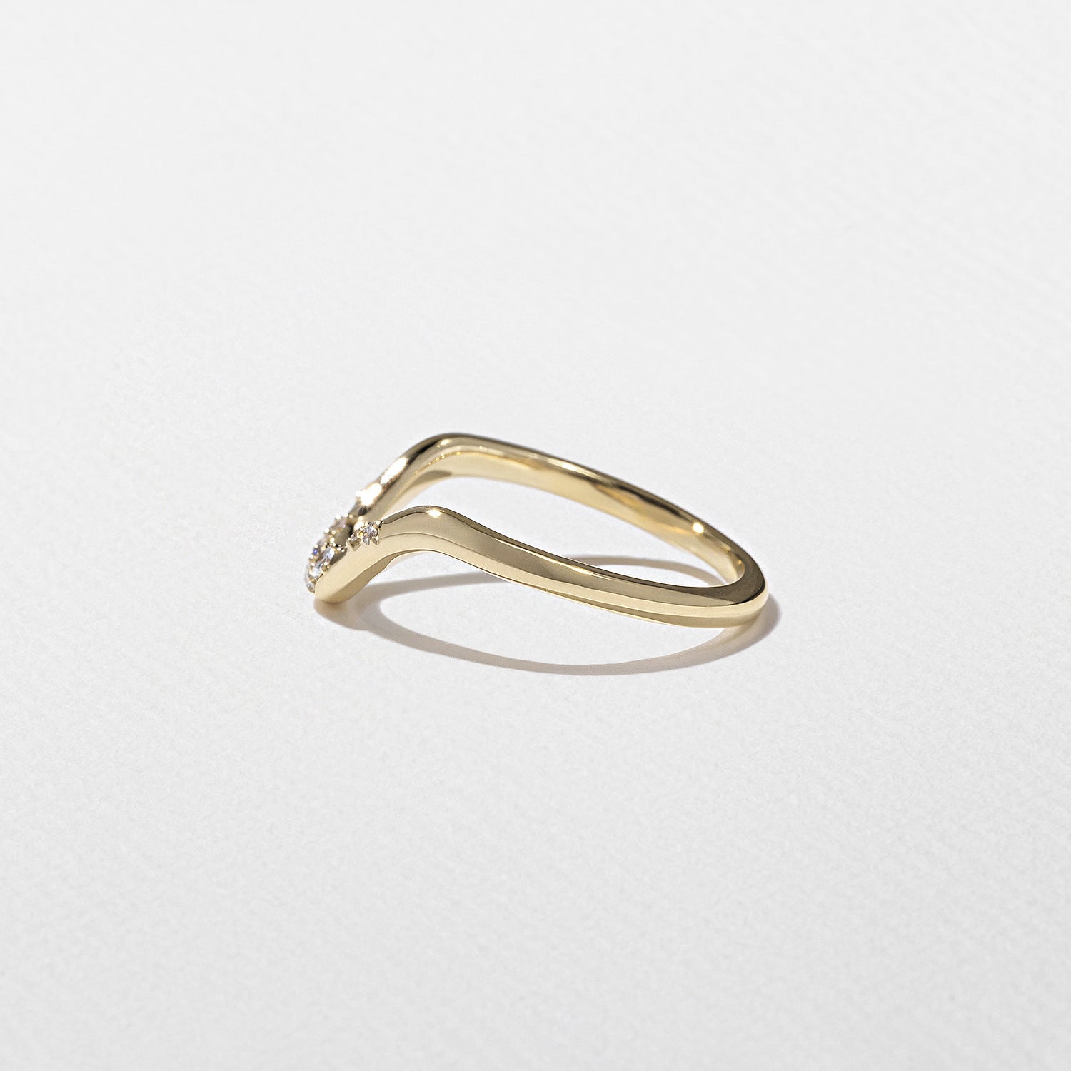 0.10 TCW Round Shape Unique Curved Wedding Band