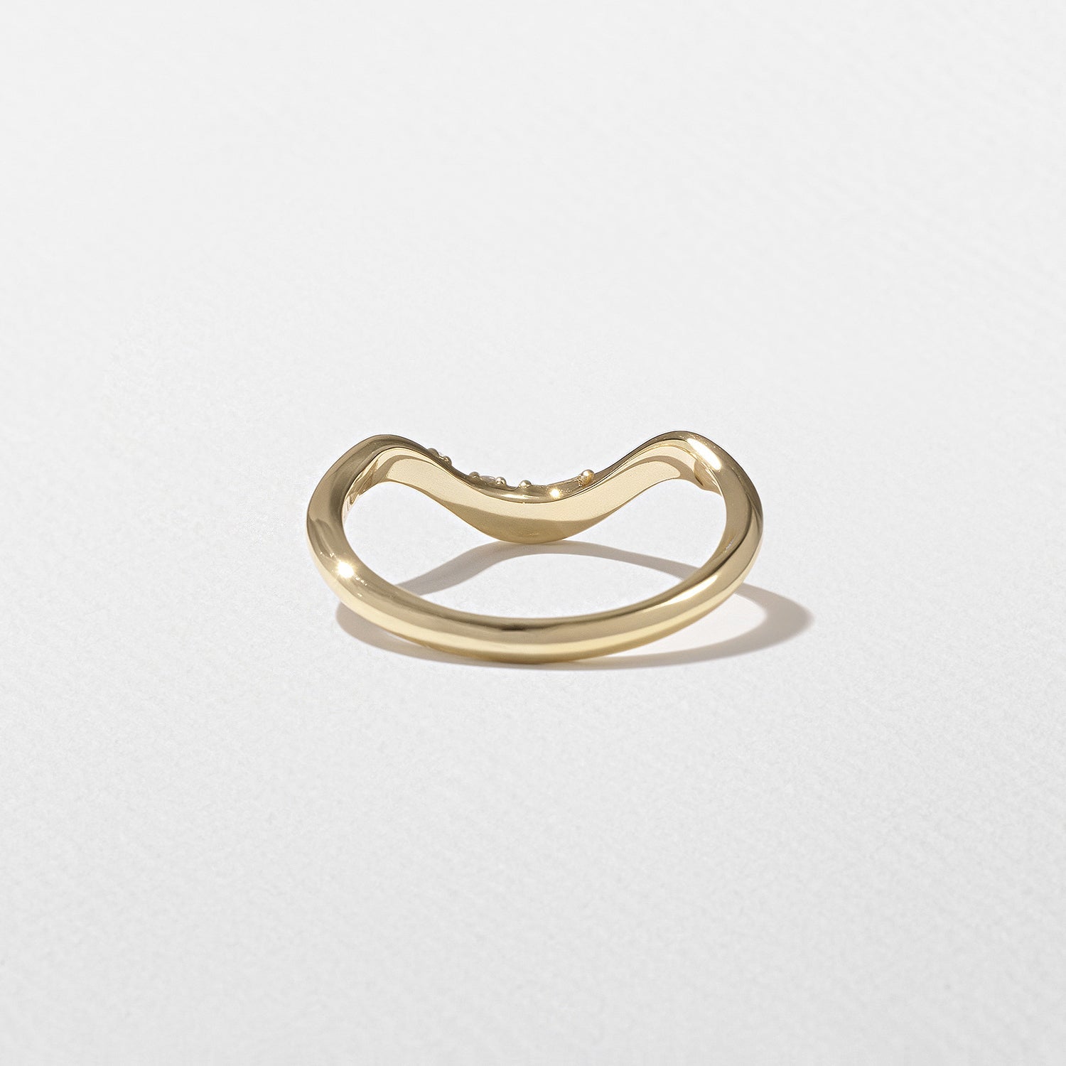 0.10 TCW Round Shape Unique Curved Wedding Band