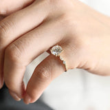 Solid Gold Round Cut Moissanite Engagement Ring with Accent Marquise