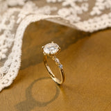 Solid Gold Round Cut Moissanite Engagement Ring with Accent Marquise