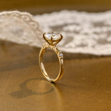 Solid Gold Round Cut Moissanite Engagement Ring with Accent Marquise