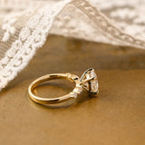 Solid Gold Round Cut Moissanite Engagement Ring with Accent Marquise