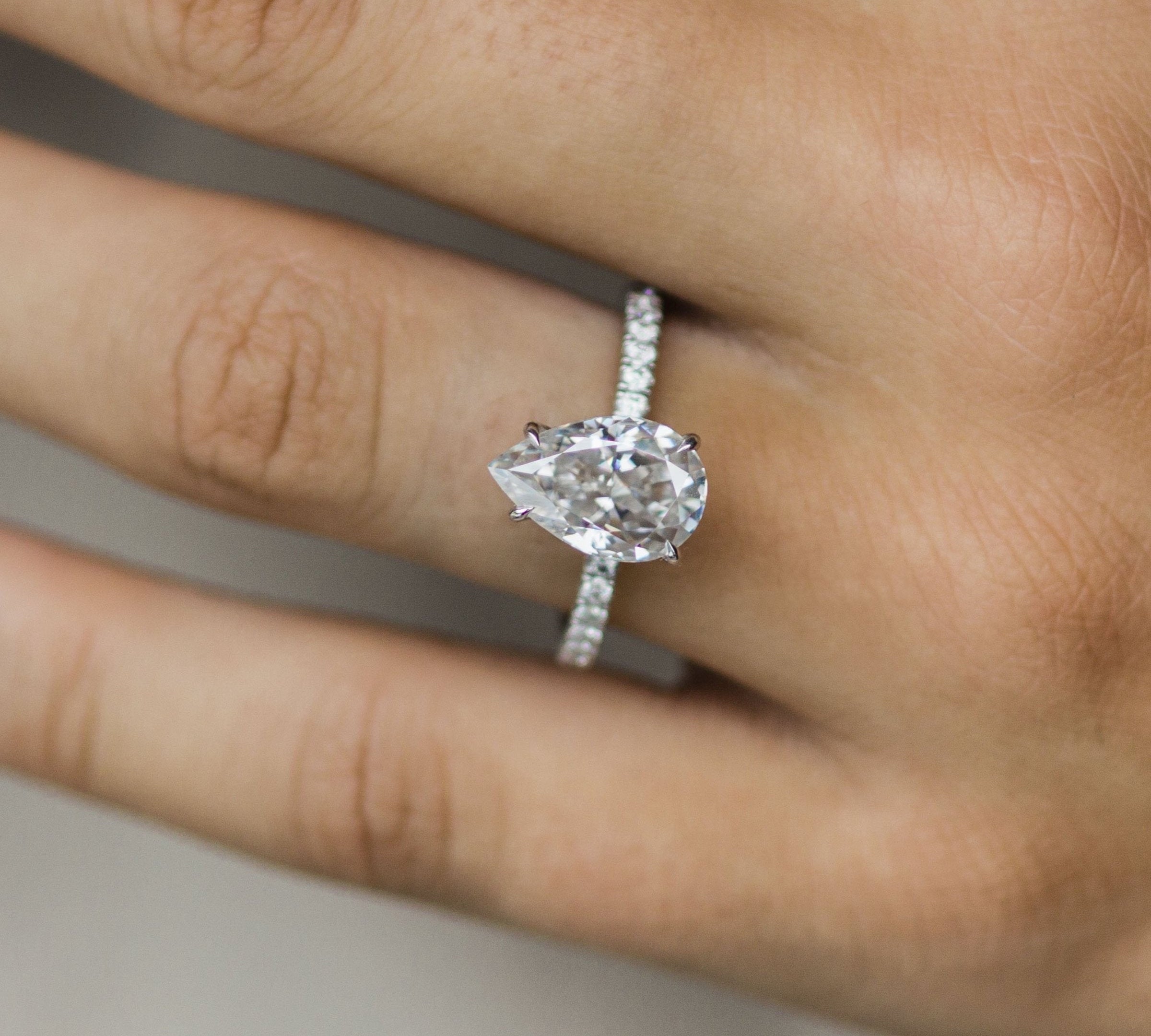 3.10 CT Pear Solitaire Hidden Halo & Pave Moissanite Engagement Ring 1