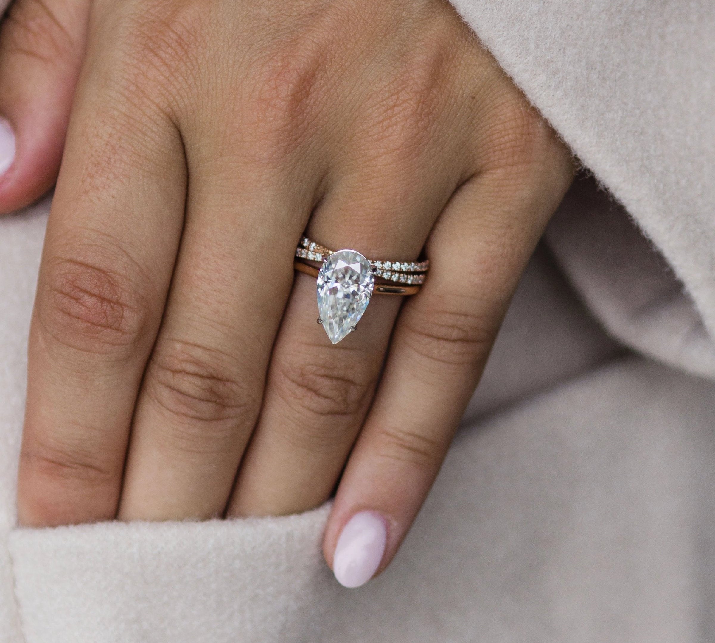 4.50 CT Pear Solitaire Bridge Moissanite Engagement Ring 1