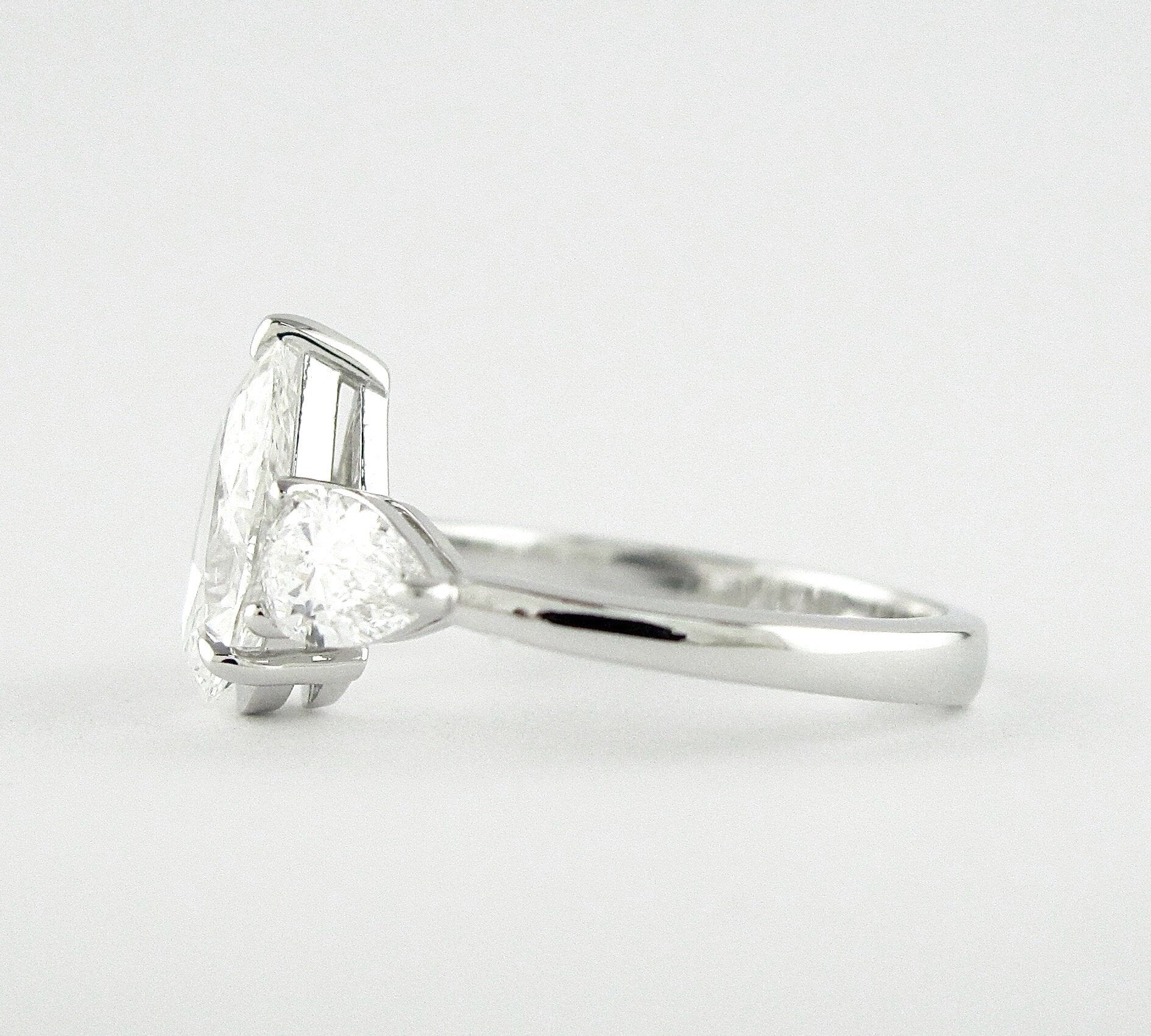 1.50 CT Pear Cut Three Stone Style Moissanite Engagement Ring 3
