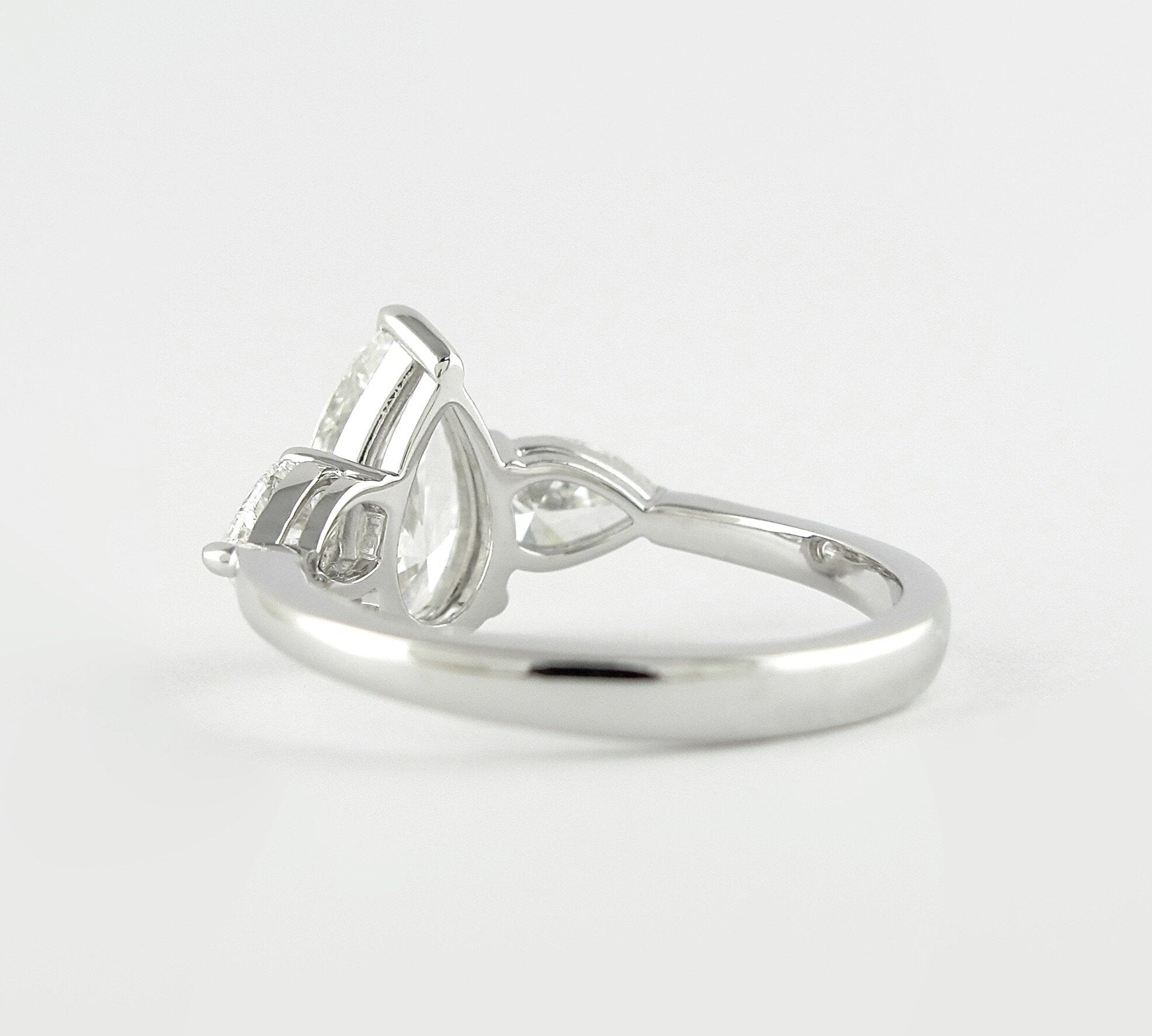 1.50 CT Pear Cut Three Stone Style Moissanite Engagement Ring 2