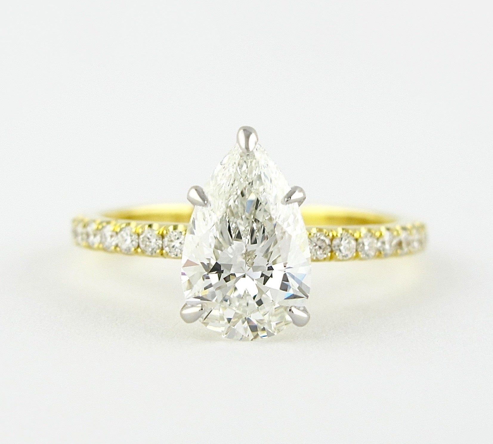 0.94 CT Pear Solitaire & Pave Setting Moissanite Engagement Ring 1