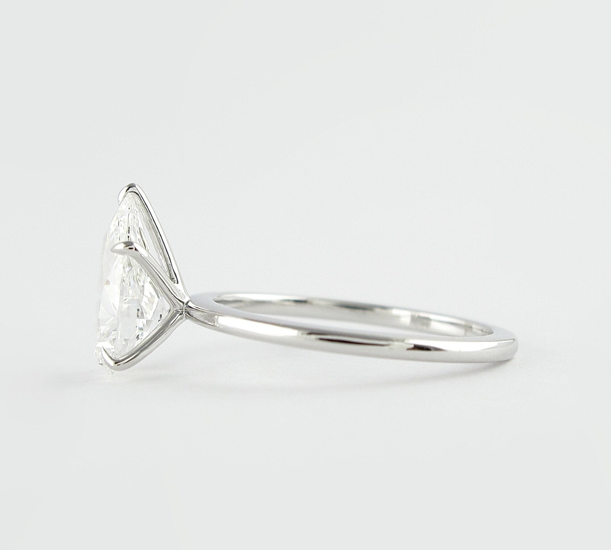 1.5 CT Pear Cut Solitaire Style Moissanite Engagement Ring 3