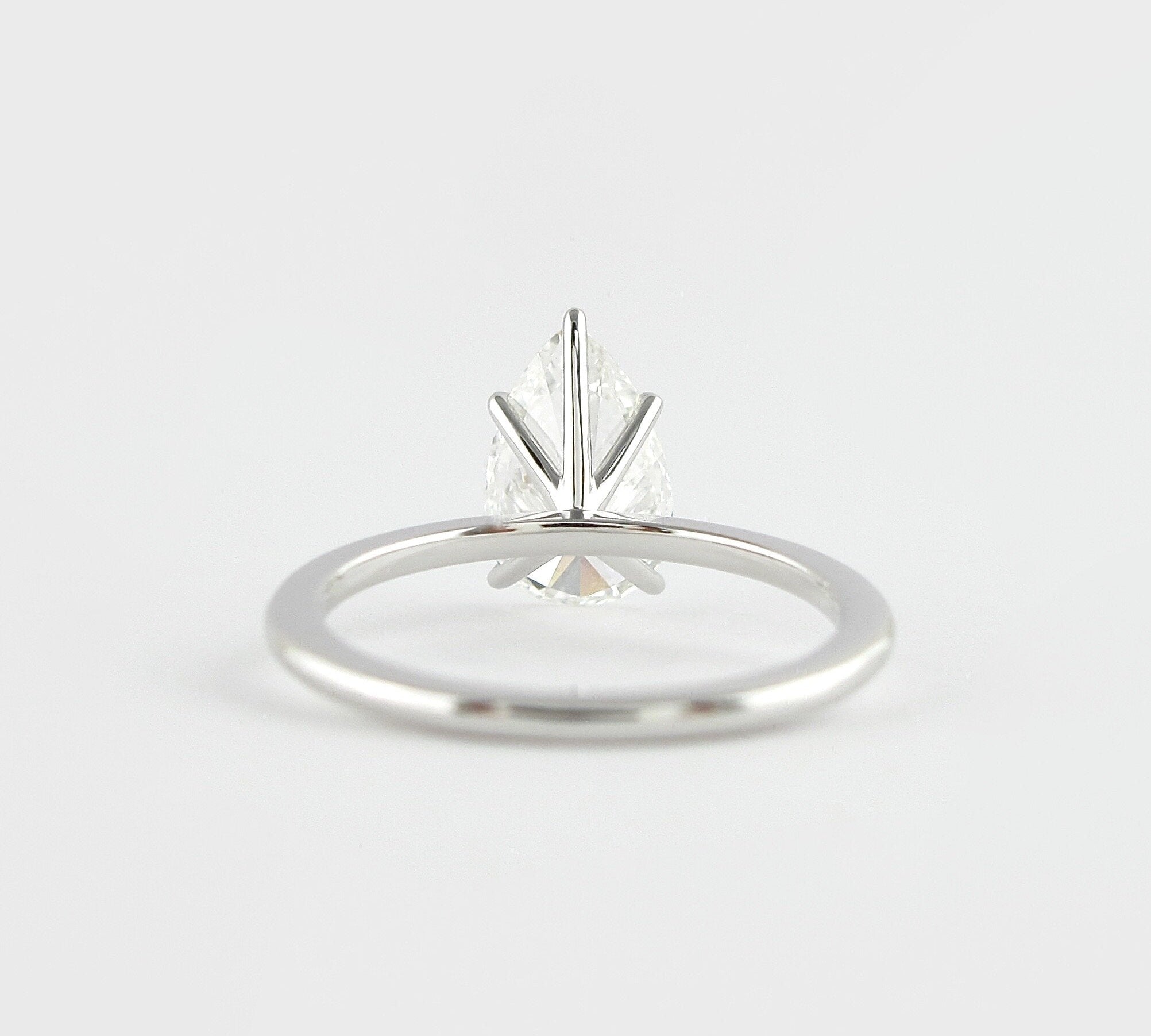 1.5 CT Pear Cut Solitaire Style Moissanite Engagement Ring 2