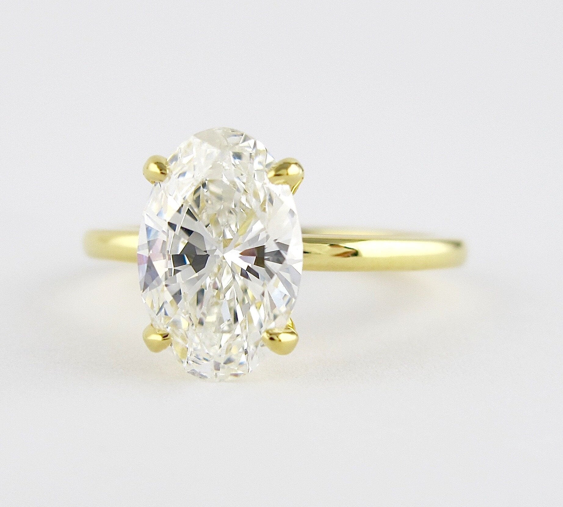 1.33 CT Oval Cut Solitaire Style Moissanite Engagement Ring 3