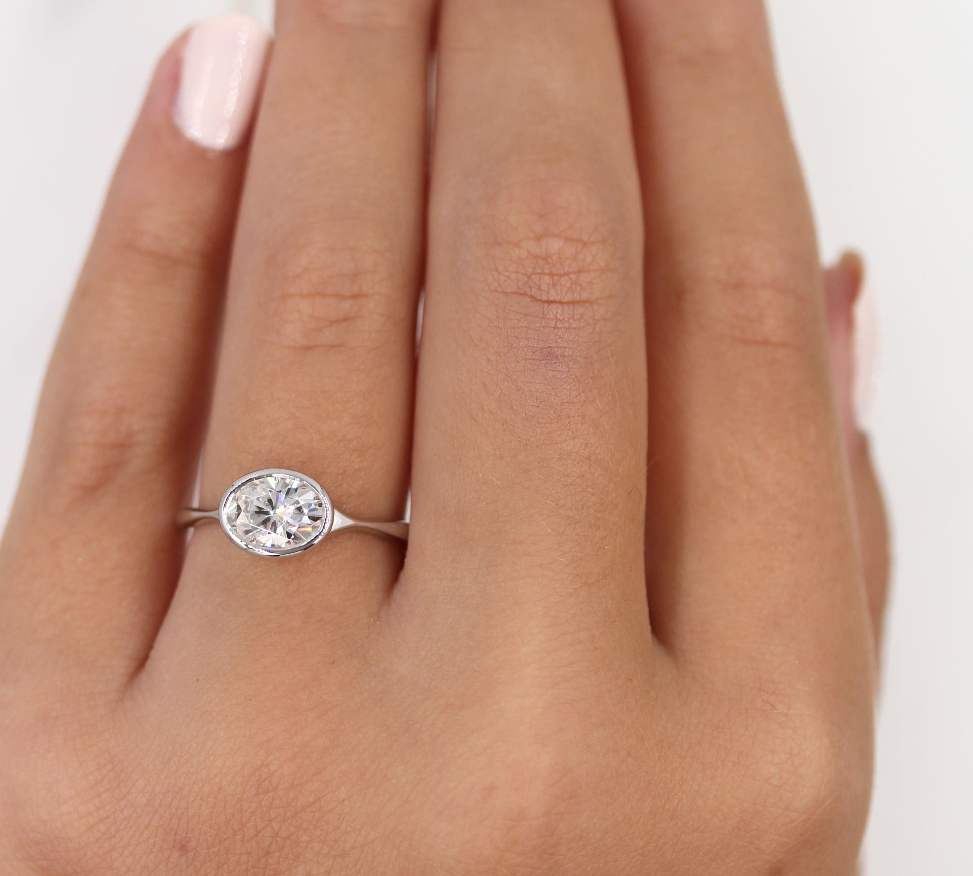 1.0 CT Oval Cut Bezel Solitaire Moissanite Engagement Ring 2