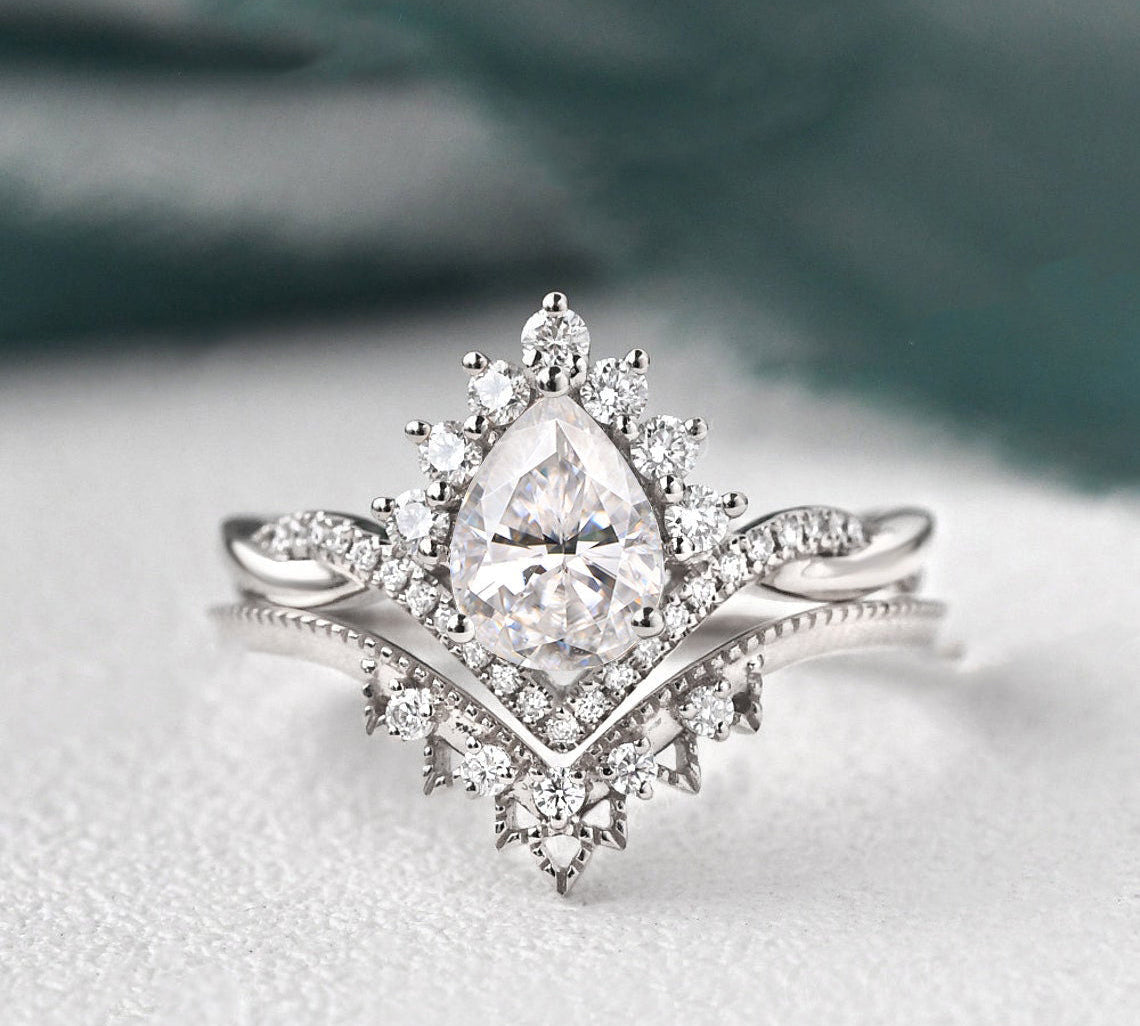1.50 CT Pear Cut Cluster Twisted Moissanite Bridal Ring Set 1