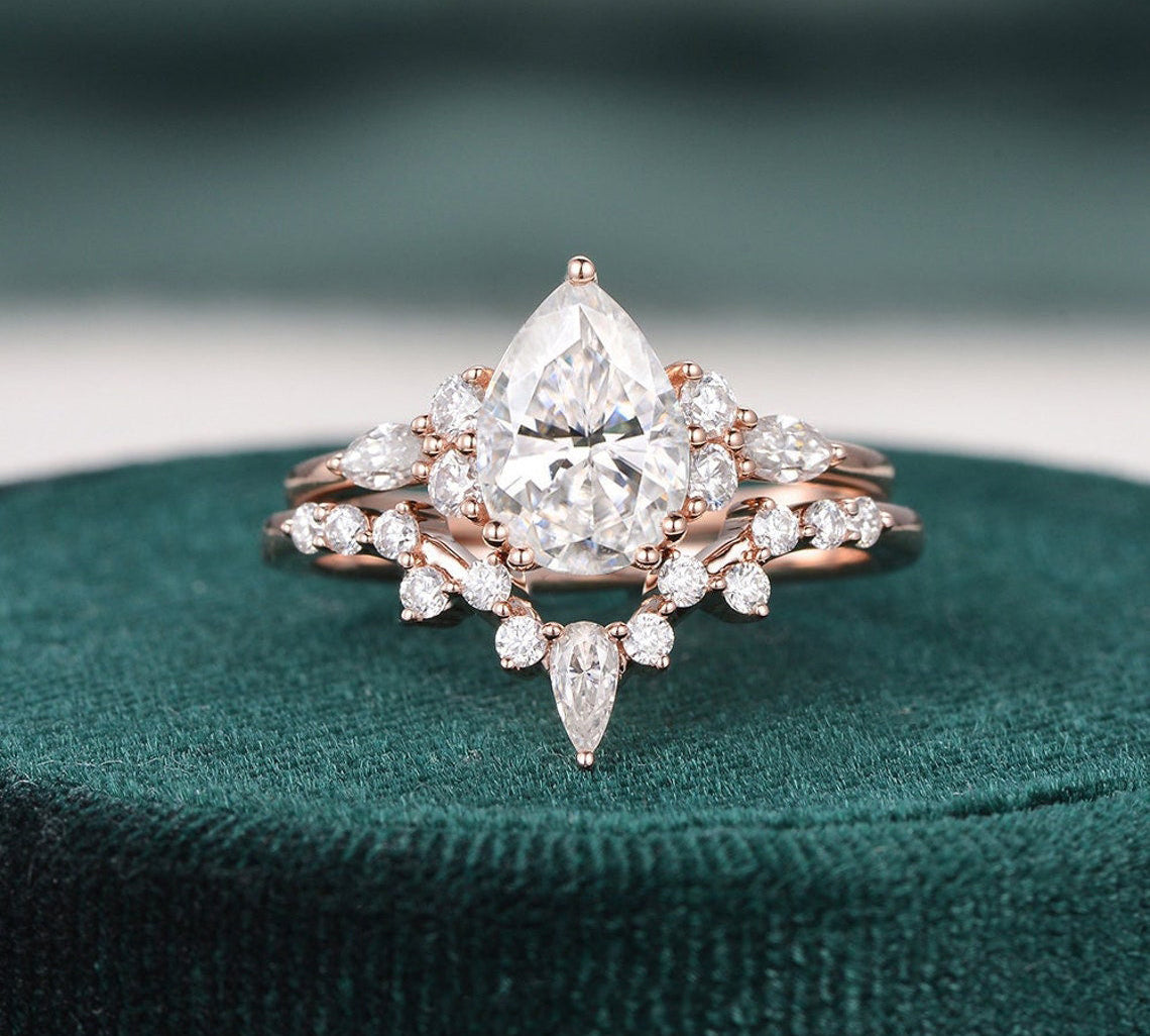 1.50 CT Pear Cut Cluster Moissanite Bridal Ring Set 1
