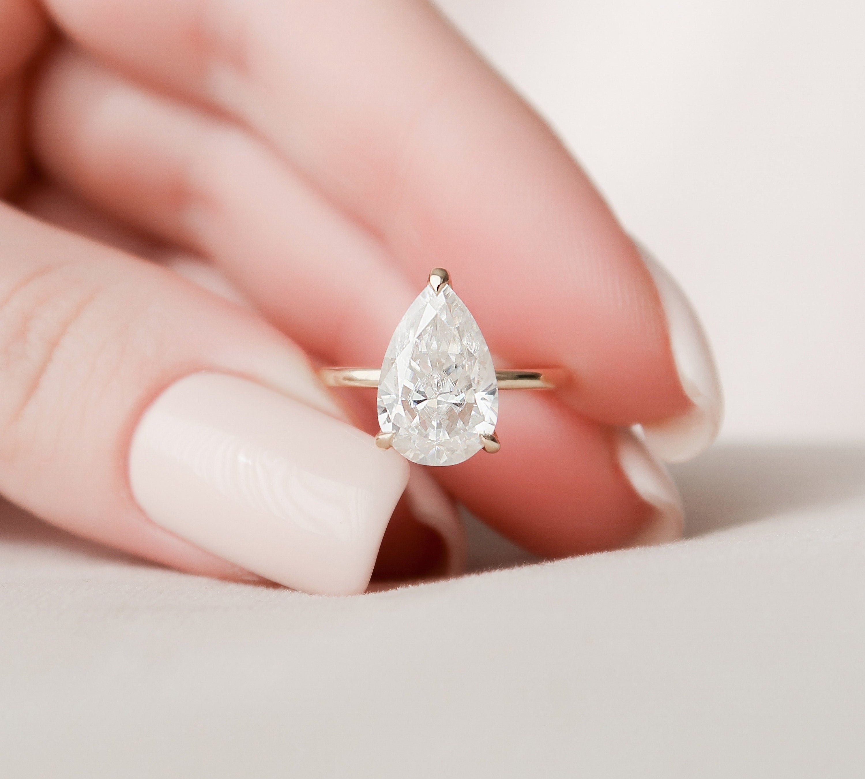 2.5 CT Pear Cut Solitaire & Hidden Halo Moissanite Engagement Ring 1