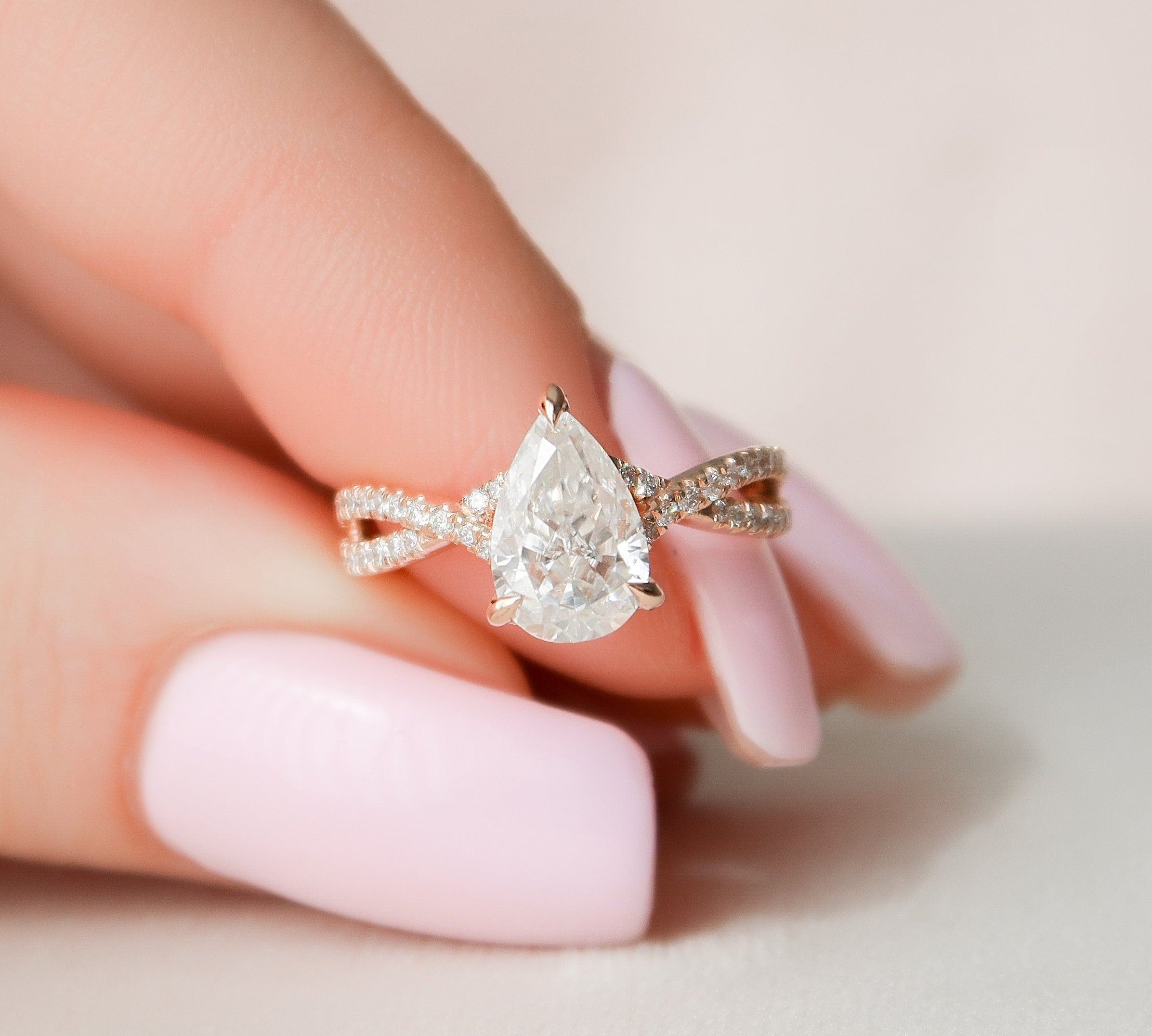 1.0 CT Pear Cut Criss Cross Pave Moissanite Engagement Ring 1