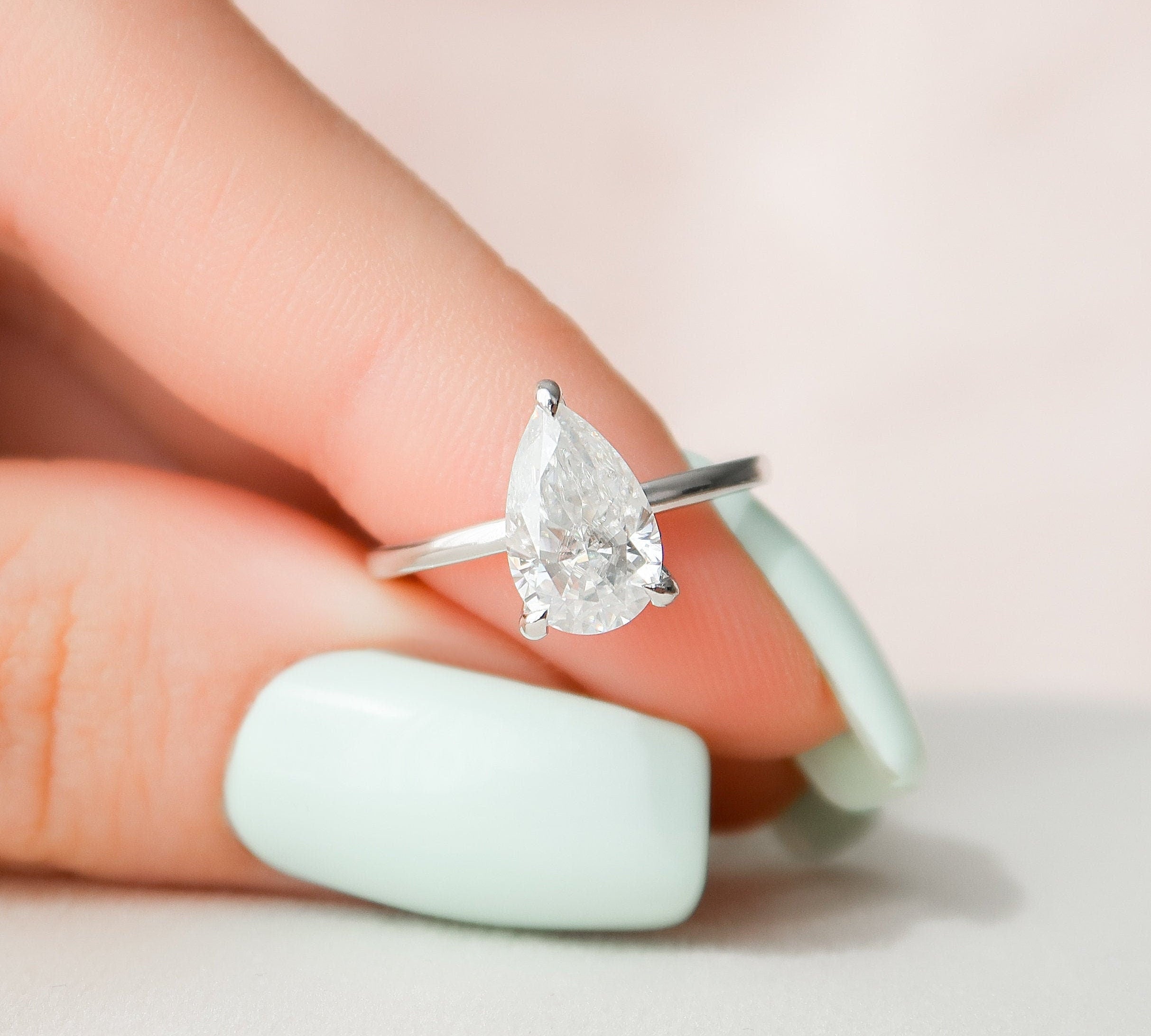 1.50 CT Pear Solitaire Moissanite Engagement Ring 1