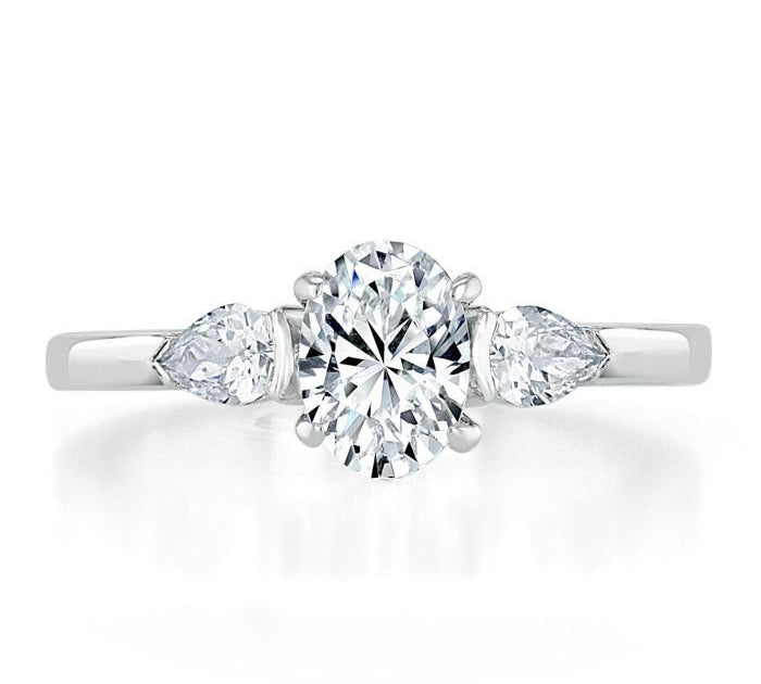 0.75 CT Oval Cut Three Stone Moissanite Engagement Ring 1